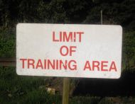 Limit of training area sign. 